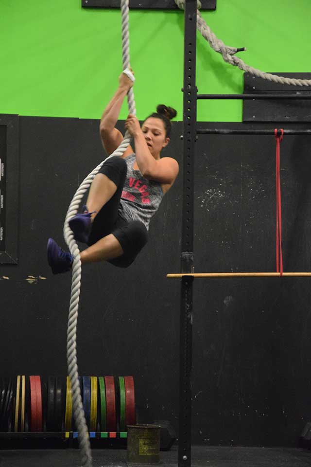 Woman rope climbing